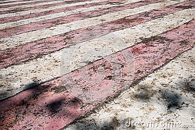 Weathered, worn out red and white stripes Stock Photo