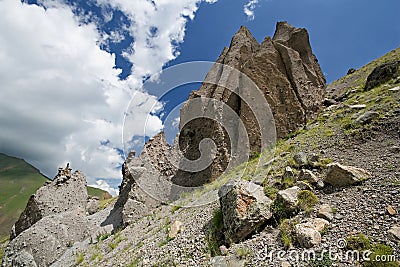 Weathering rocks on mountain slope in Caucasus Stock Photo