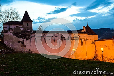 The Weavers Bastion and the old wall that surrounds the old city of Brasov. Blue hour image. Stock Photo