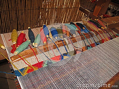 Weaving with an old traditional loom, Teotitlan, Mexiko Stock Photo