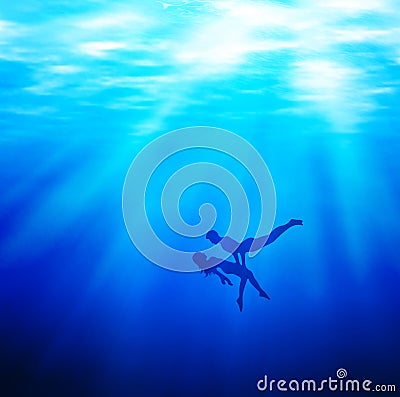 The fall, the rise, rebirth love, underwater couple, sinking lovers, light rays though water Stock Photo