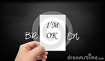 "I'M OK - BROKEN" Fake mask for hiding real emotions Stock Photo