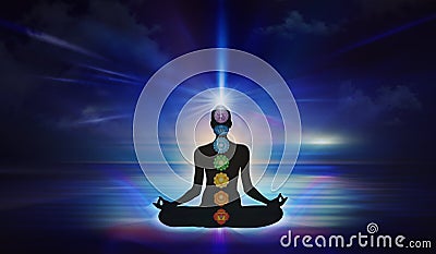 Yoga woman silhouette meditating at sunset colorful background Stock Photo