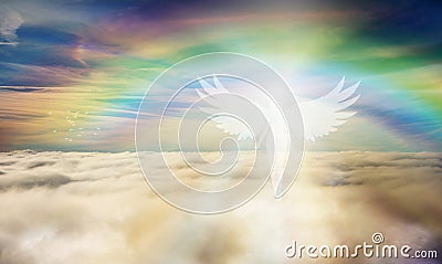 Spiritual guidance, Angel of light and love doing a miracle on sky, rainbow angelic wings Stock Photo