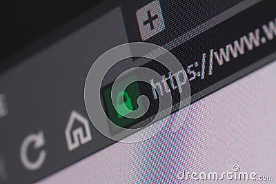 Web browser closeup on LCD screen with depth of field and focus on https word Stock Photo