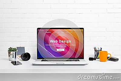 Web design studio concept web site on laptop display Stock Photo