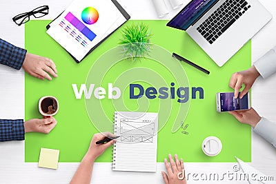 Web design text on office desk. Concept of web development team work space Stock Photo