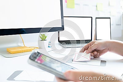 Web designer, UX UI designer working to design screen. Stock Photo