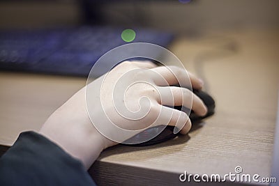 Web search. Hand on the mouse. Stock Photo