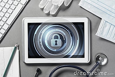 Web security and technology concept with tablet pc on table Stock Photo