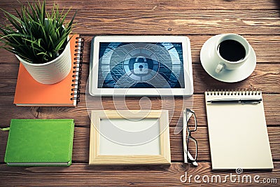 Web security and technology concept with tablet pc on wooden tab Stock Photo