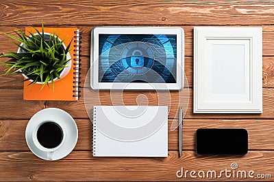 Web security and technology concept with tablet pc on wooden table Stock Photo