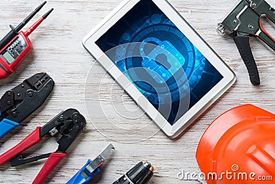 Web security and technology concept with tablet pc on wooden table Stock Photo