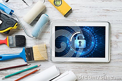 Web security and technology concept with tablet pc on wooden table Stock Photo