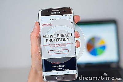 Web site of Comodo Cybersecurity company on phone screen Editorial Stock Photo