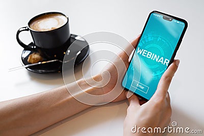 Webinar E-learning Online Training Coaching Education concept on mobile phone screen. Stock Photo