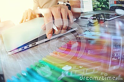 Website designer working digital tablet and computer laptop with Stock Photo