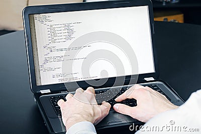 Website development process - programmer writing code Stock Photo