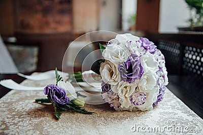 Wedding bouquet and bridesmaid shoes, boutonniere Stock Photo