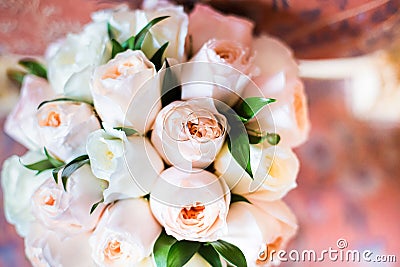 Wedding bouquet lying on chair Stock Photo