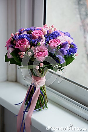 Wedding bouquet in pink and purple tones. Beautiful and delicate.General view Stock Photo