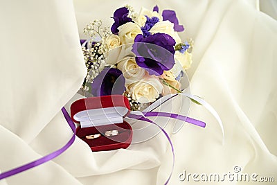 Wedding bouquet and rings. marriage invitation on white background with copy space Stock Photo