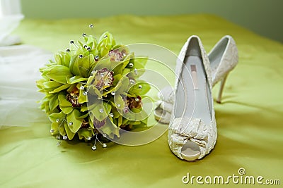 Wedding bouquet and shoes Stock Photo