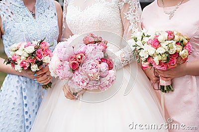 Wedding bouquets at the bride and bridesmaids Stock Photo