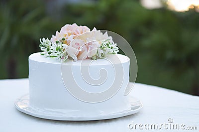 Wedding cake beautiful decorated with roses Stock Photo