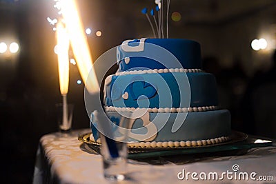 Wedding cake with shiny sparklers Stock Photo