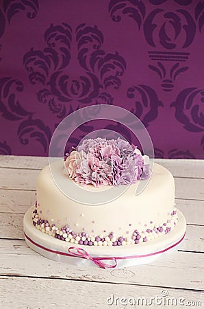 Wedding cake with sugar flowers Stock Photo