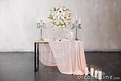 Wedding ceremony decoration. Decoration of wedding table with tender pink textile. Stock Photo