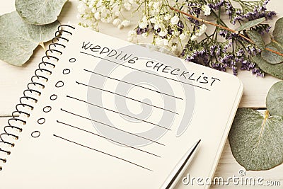 Wedding checklist and cute flowers Stock Photo