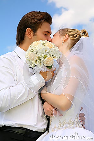 Wedding couple with bouquet Stock Photo