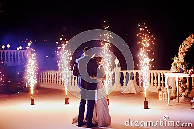 Wedding couple dancing in sparklers their first dance Stock Photo
