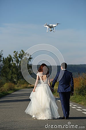 Wedding couple and drone Stock Photo