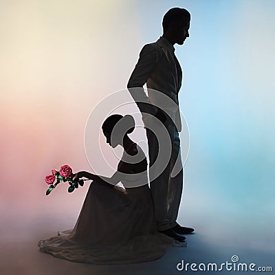 Wedding couple silhouette groom and bride on colors background Stock Photo