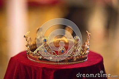 Wedding crown in the cherch yellow in red Stock Photo