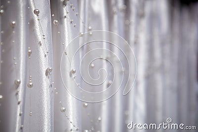 Wedding decorations - pearl beads on a background Stock Photo