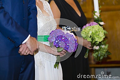 The bride bouquet and her new ring, wedding detail Stock Photo