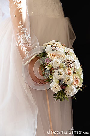 Wedding fashion portrait of young couple with nice boquet. Bride and groom in Riga, Latvia Stock Photo