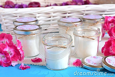 Wedding favors candles glass jars jute ribbon small guest gifts original party souvenirs Stock Photo