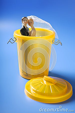 Wedding figurione on the yellow trash Stock Photo