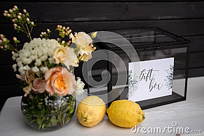 Wedding glass box for gits, decorated with fresh flowers. Stock Photo