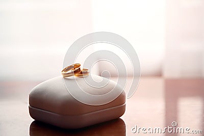 Wedding gold rings lie on a box Stock Photo