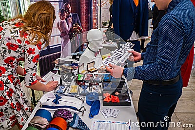 Visitor is checking Paul Becker stand at the wedding exhibition Editorial Stock Photo