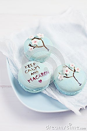 Wedding macarons with fondant flower decorations Stock Photo