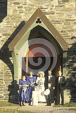 A wedding party in front of Trinity Parish Church, Route 169, CT Editorial Stock Photo