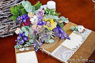 Wedding photo album bouquet eucalyptus cotton and other flowers. Stock Photo