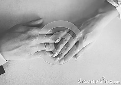 Wedding photo, hand of the bride and groom with rings together Stock Photo